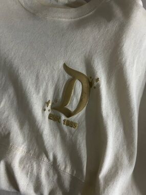 Disney Cream Sweatshirt with Gold Metallic 'Disney' Graphic